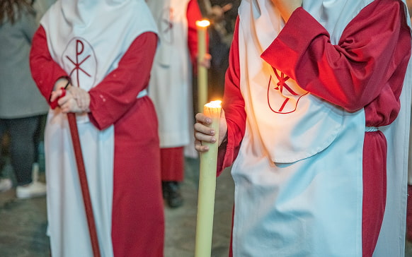 Granada Brotherhood Nazarenos wearing white and red tunics